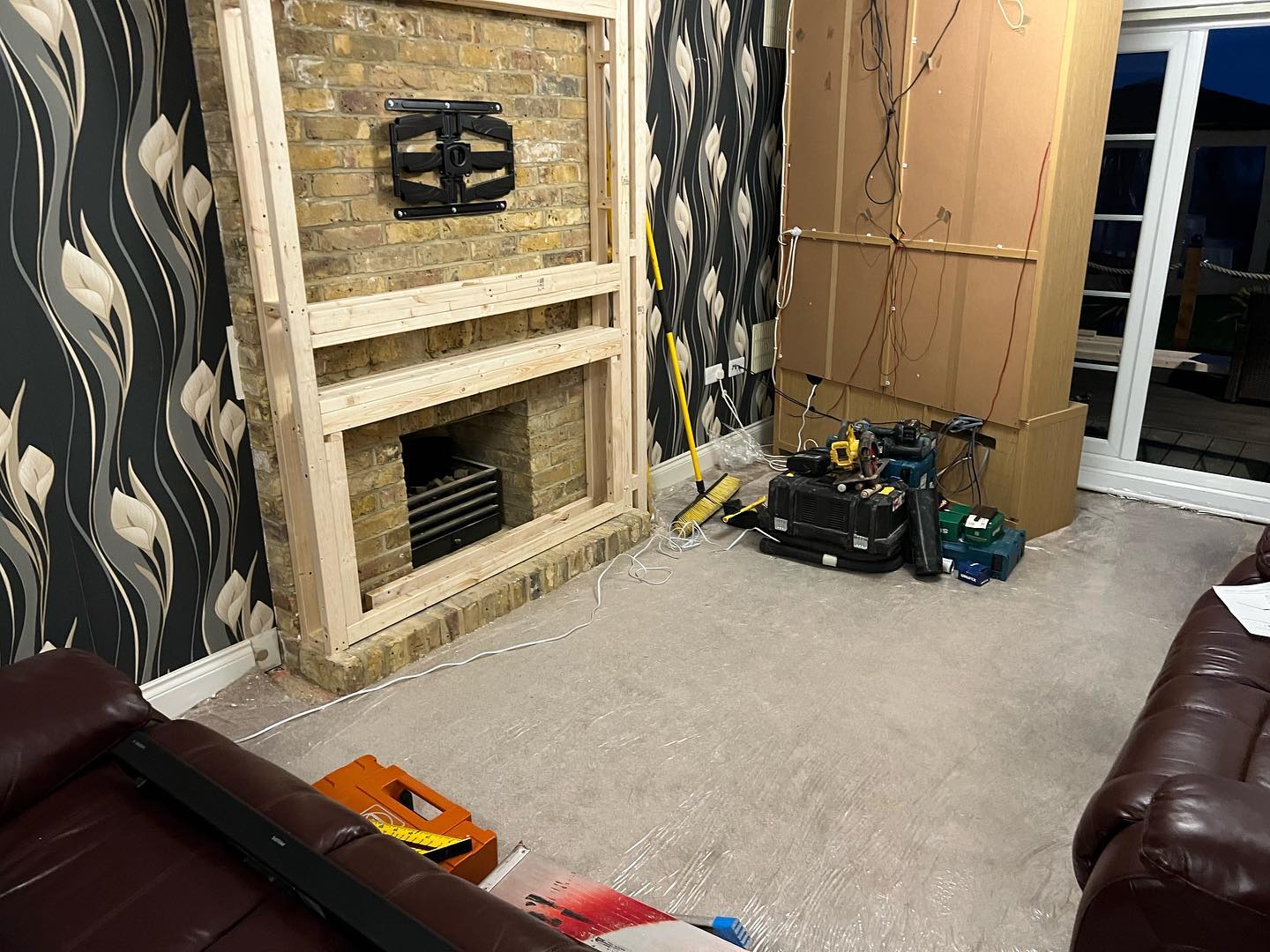 Process of wooden structure of a media wall in Rochester, Kent