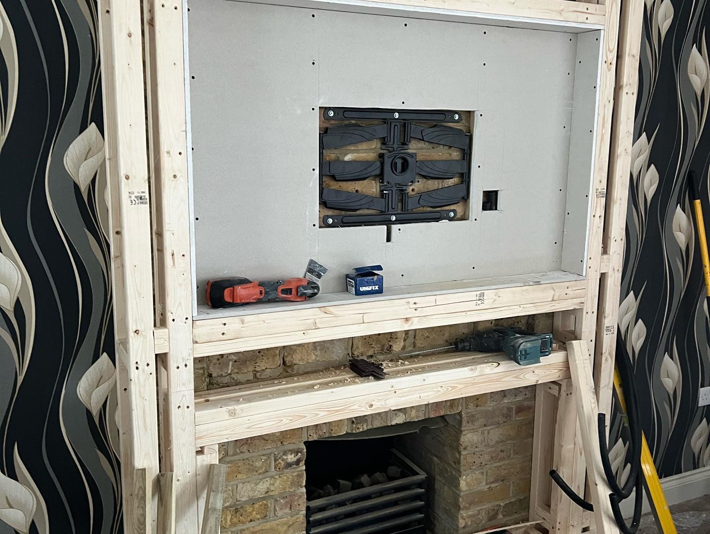 Wooden structure of a media wall in Rochester, Kent