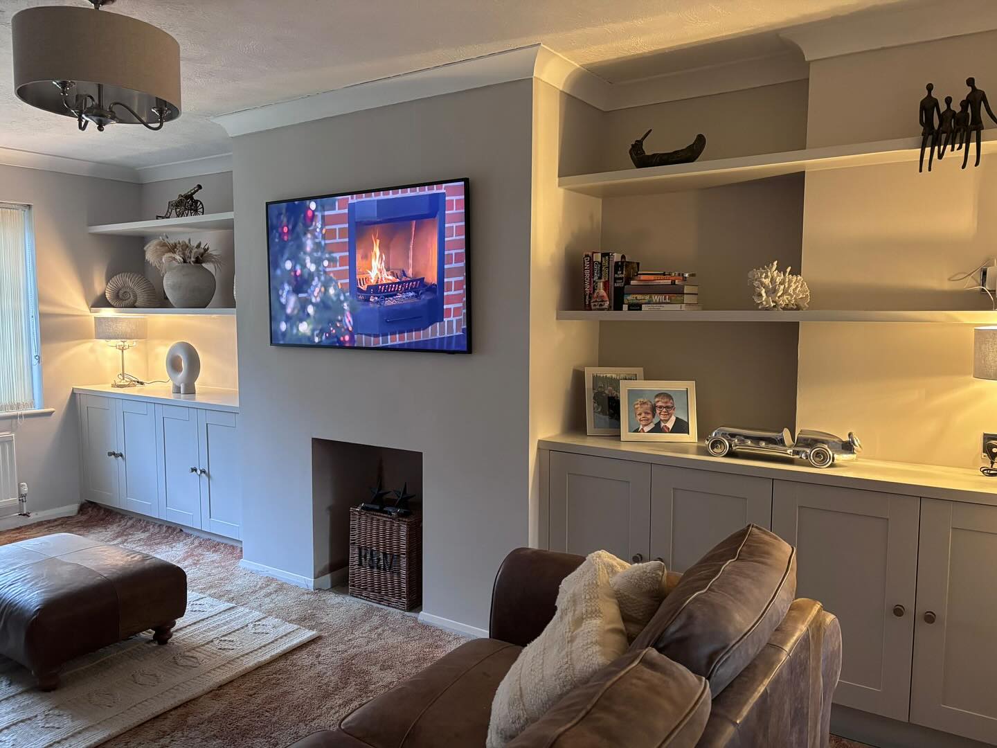 Finished custom made media wall for TV, storage and shelves in Rochester, Kent