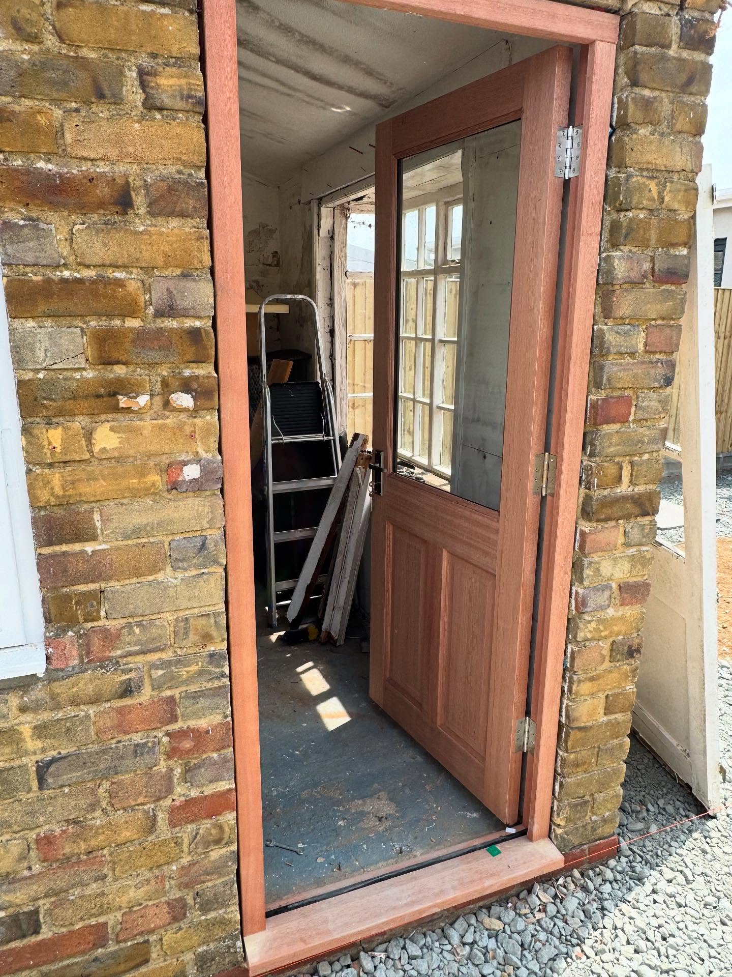 Real wooden back door with large window section in Rochester, Kent