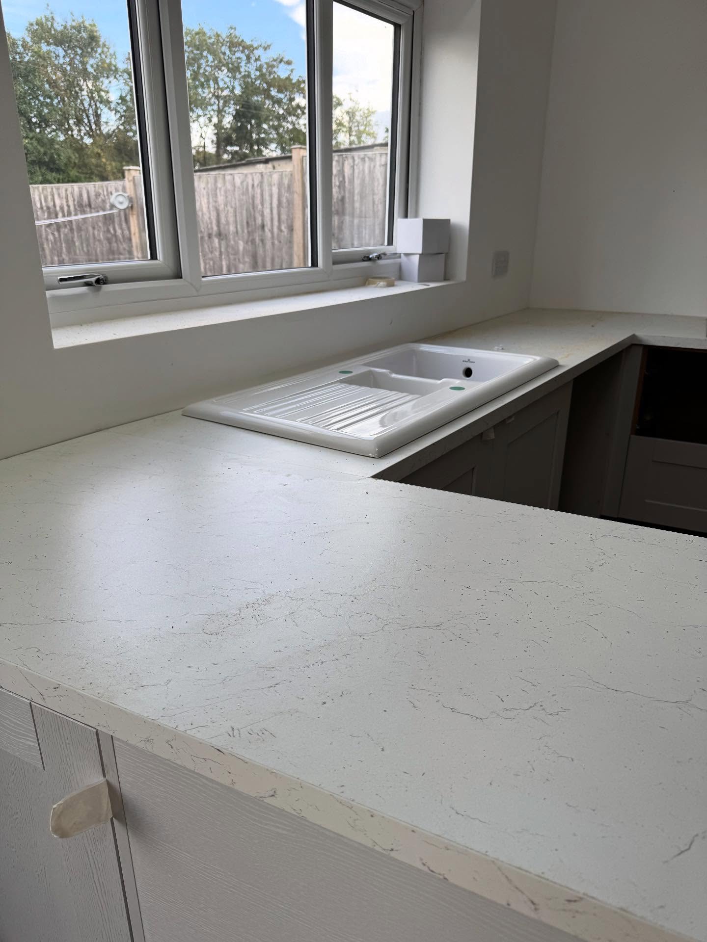 White marble worktops with white sink in Rochester, Kent