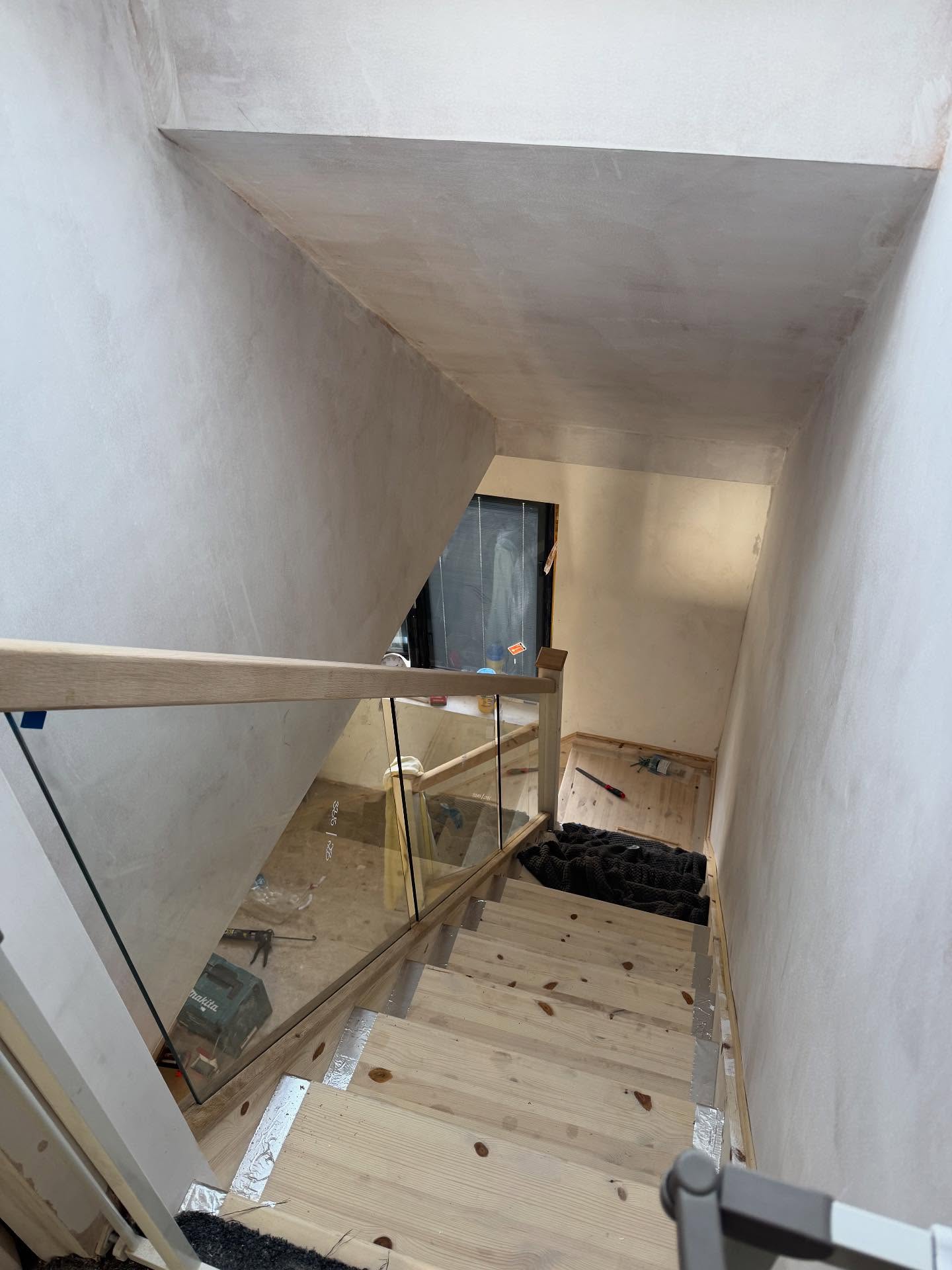 Fitted staircase with bannister and glass panels in Rochester, Kent